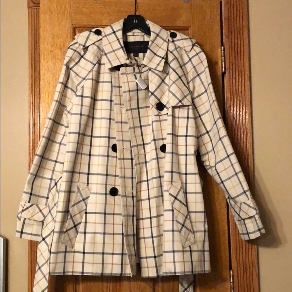 Tan Coach jacket. Never wore. XL